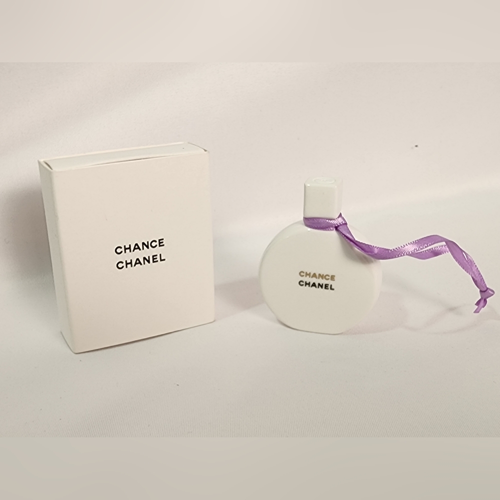 CHANEL White Perfume Bottle with Purple Ribbon